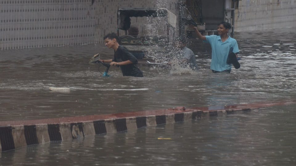 up weather agra rain flooded streets waterlogging traffic chaos Schools up to class 12th are closed