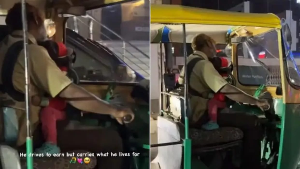 In the absence of the mother the father was seen driving the auto with the child in his lap Video goes Viral