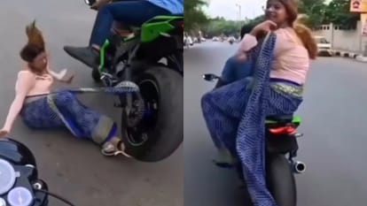 चलती बाइक से गिरी लड़की