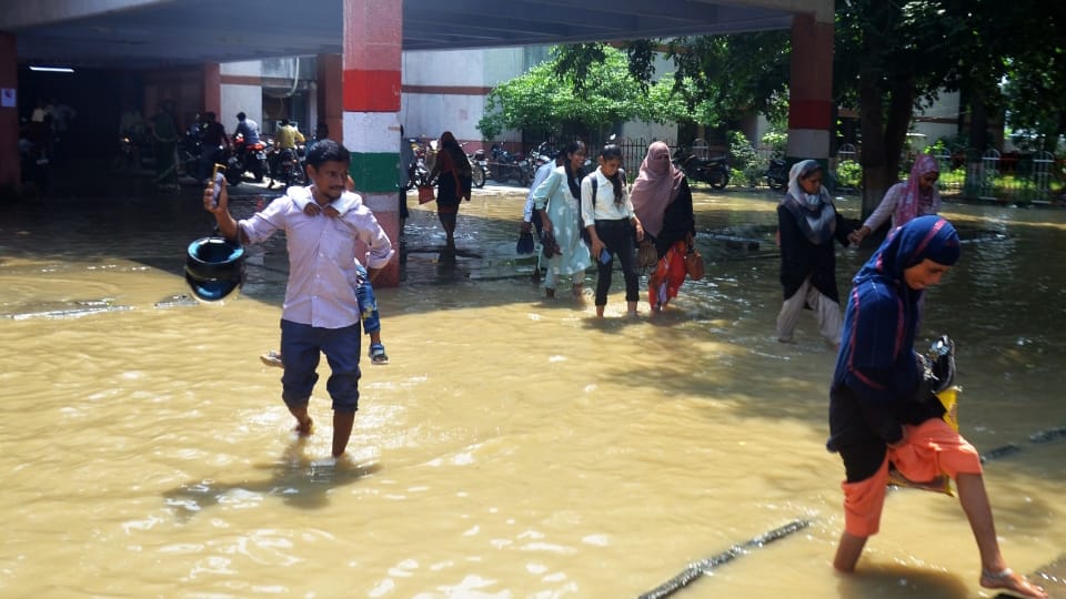 Shahjahanpur News Six PET exam centers shifted due to flood Two feet water on Delhi-Lucknow highway