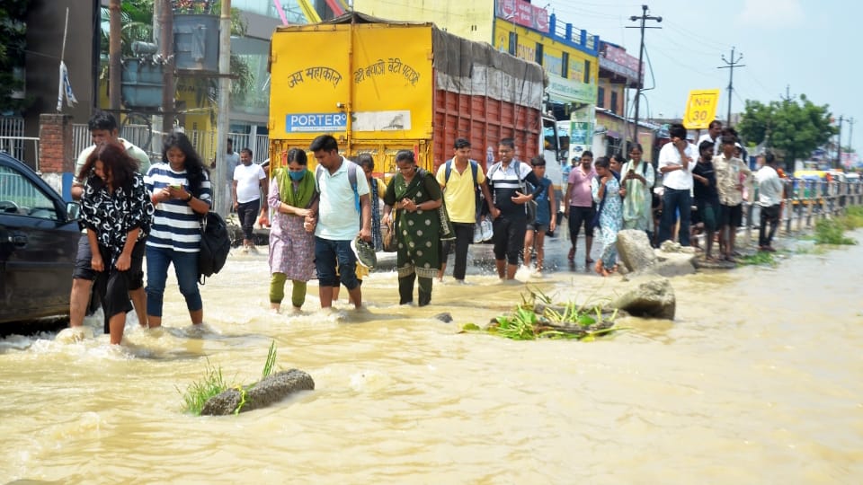 Shahjahanpur News Six PET exam centers shifted due to flood Two feet water on Delhi-Lucknow highway