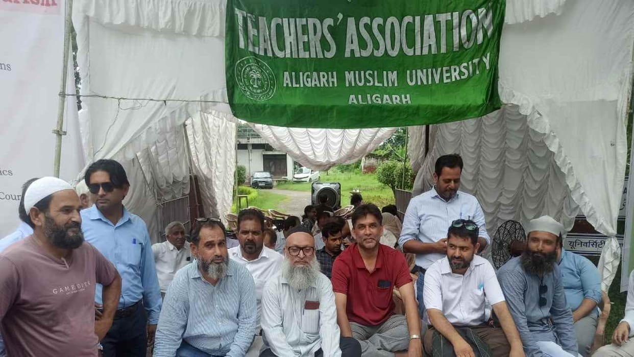 Teachers union staged a sit-in protest at AMU over various demands and 'Registrar Go Back'