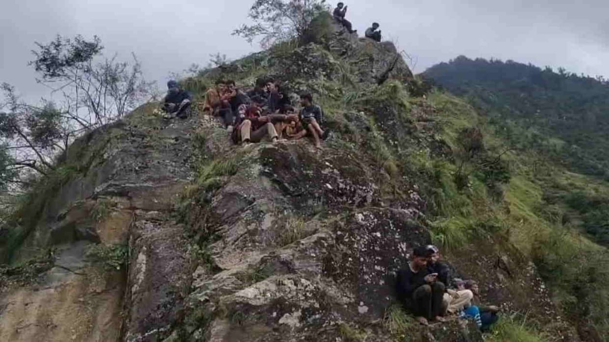 Network Problem People climbing rocks and hills in search of a mobile network Barkot Uttarkashi News