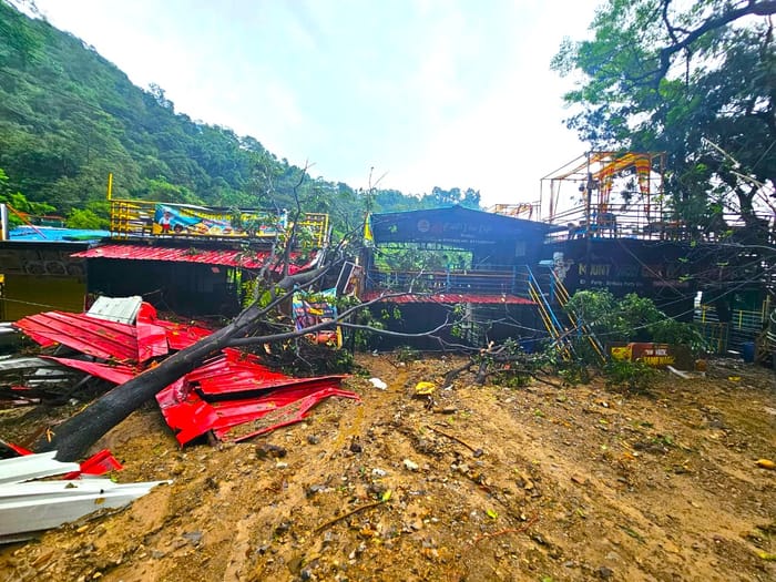 Dehradun weather Heavy Rainfall in Mussoorie Roads collapsed hotels and restaurants destroyed Road Closed