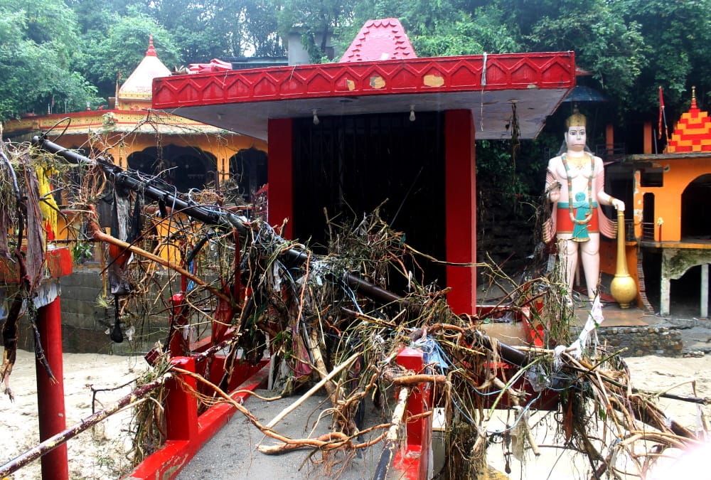 Dehradun Cloudburst Tamsa river havoc in Tapkeshwar Mahadev temple Shiva idol was washed away Photos