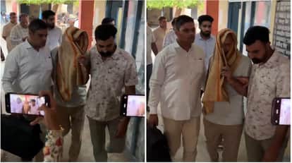 गिरफ्तार पुलिसकर्मी