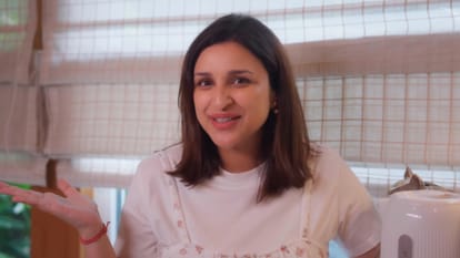 Mom to be Parineeti Chopra flaunts her baby bump on her youtube vlog share video