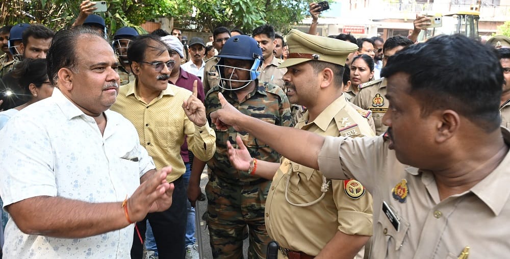 Kanpur Bulldozers run park built on school land demolished people clashed with police in protest