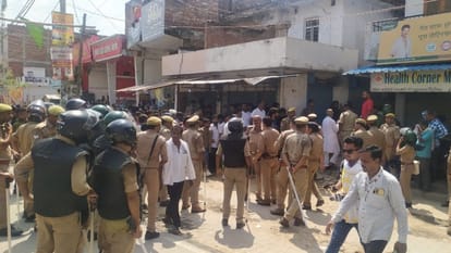 seven year old boy child murder in azamgarh body placed in sack and hung from gate