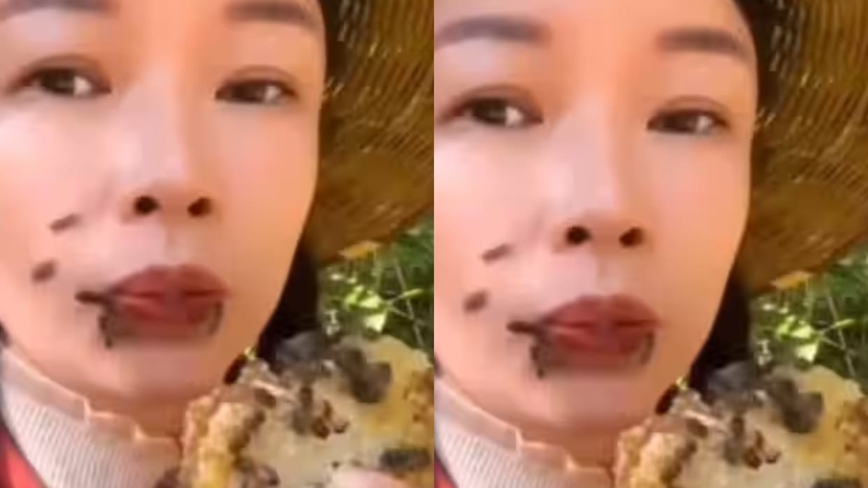 This girl ate honeycomb with bread bees stuck to her lips leaving people stunned Video goes Viral