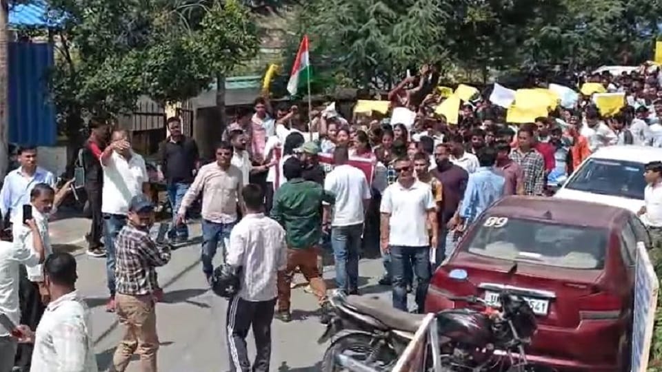 youths staged a procession in the paper leak case in pithoragarh