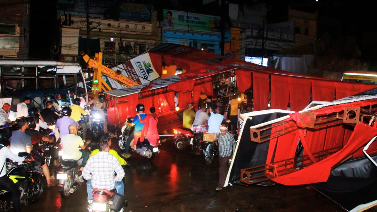 Durga Puja pandal gates collapse Storm and rain wreak havoc in Varanasi disrupting several routes