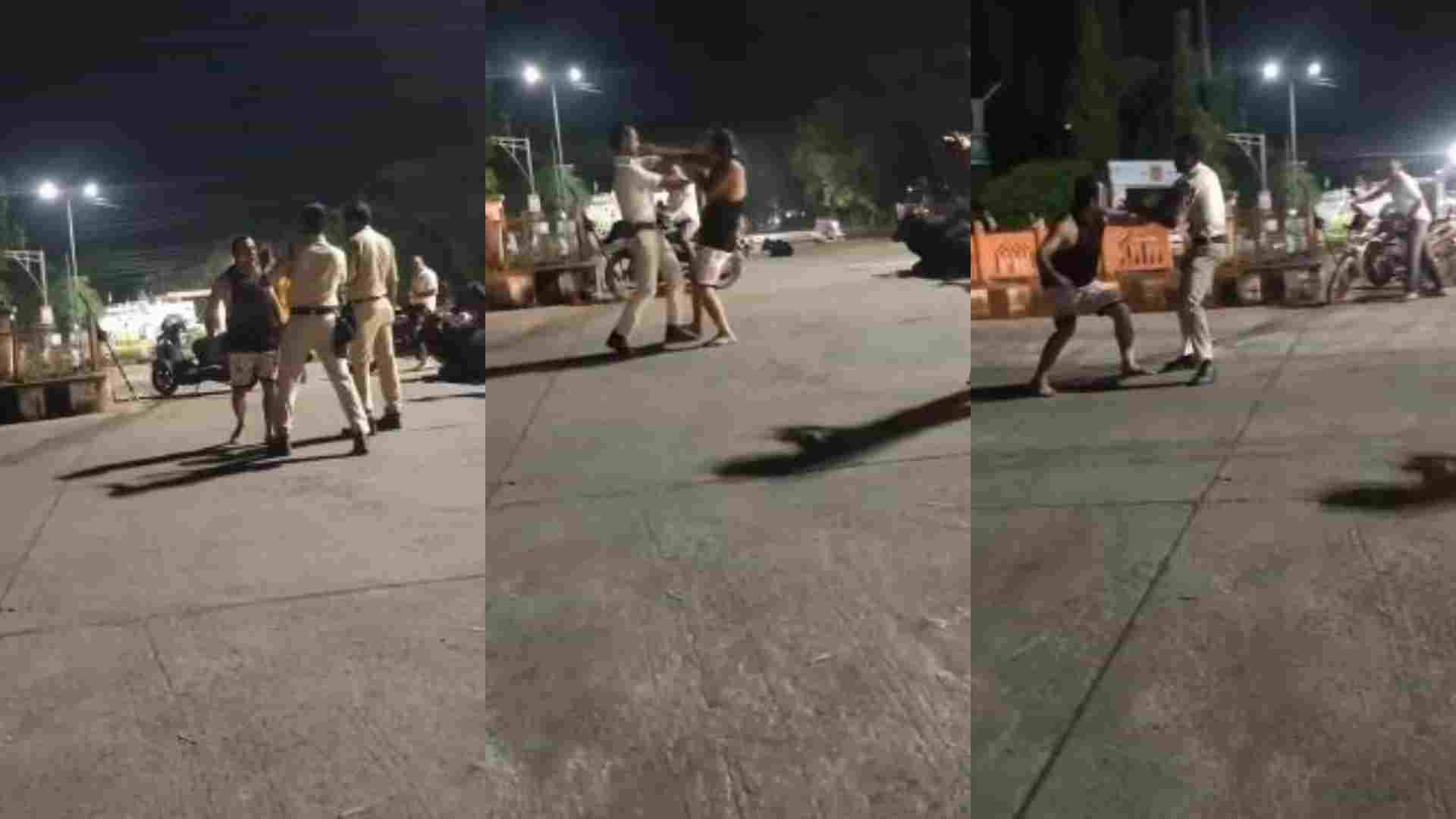 पुलिसकर्मी से मारपीट करता स्टंटबाज।