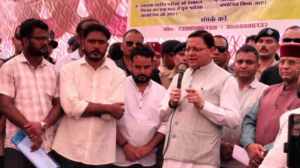 Dehradun UKSSSC paper leak case CM Dhami arrives at protest site to talk with Youths