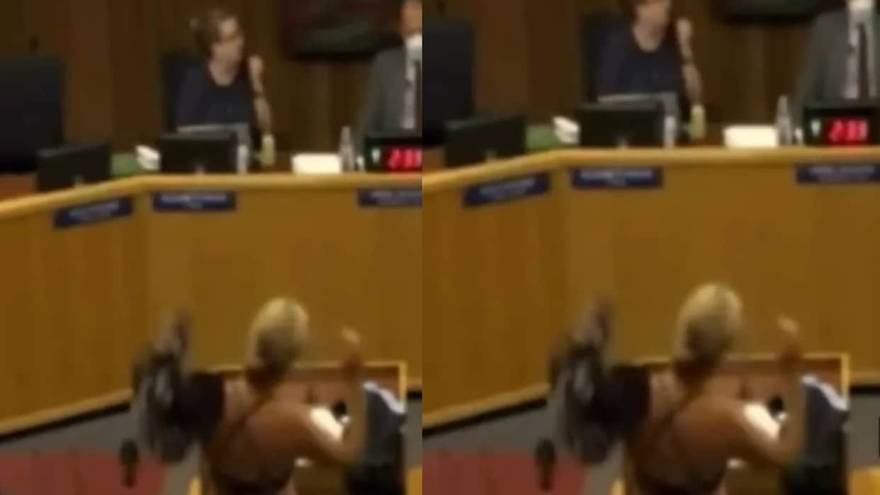 A woman suddenly began taking off all her clothes during a meeting causing a stir video has now gone viral