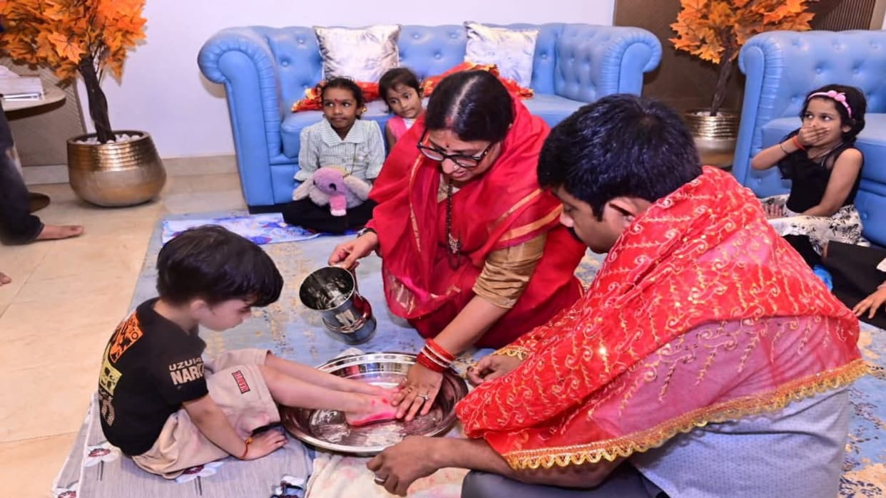 Minister Nandi along with his family worshipped girls in the form of Shakti and washed their feet in the river