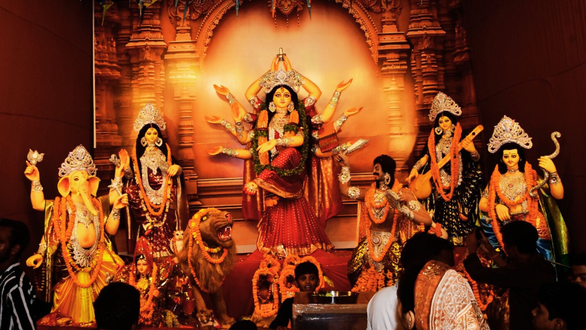 Durga Puja in pictures Some with AI themes others with Dhunuchi dances devotees flock to Kashi 512 pandals