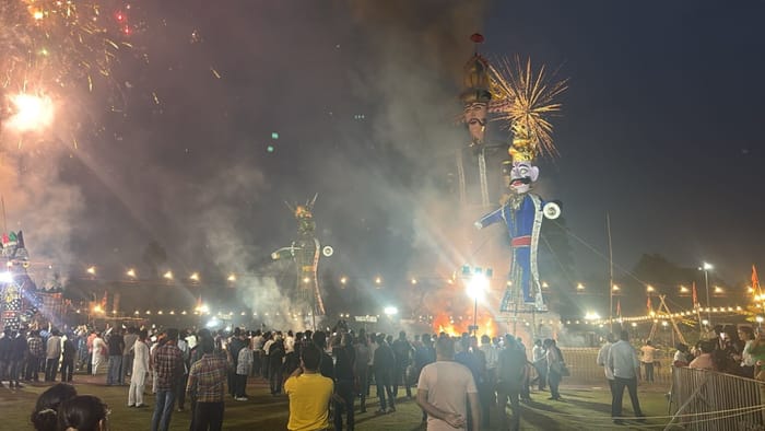 Dussehra 2025 Ravana Dahan in Uttarakhand Rainfall in dehradun CM Dhami attends parade ground program Photos