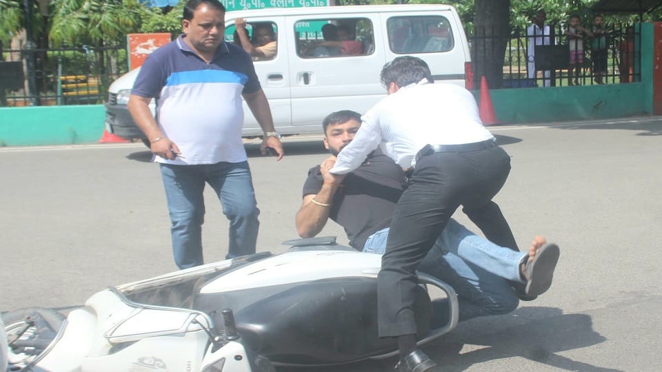 Meerut: Hotel Harmony owner's son hits lawyer with car, punches and kicks him in front of police