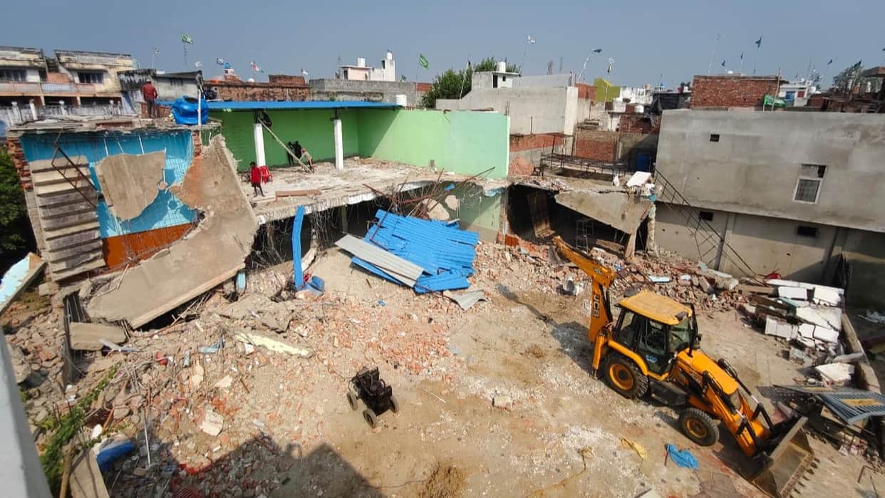 Bulldozer action on illegal properties of rioters who pelted stones during Navratri festival in Gandhinagar