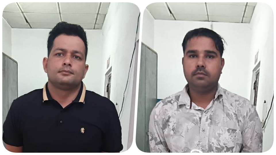 Two policemen arrested for plotting to free a jailed prisoner