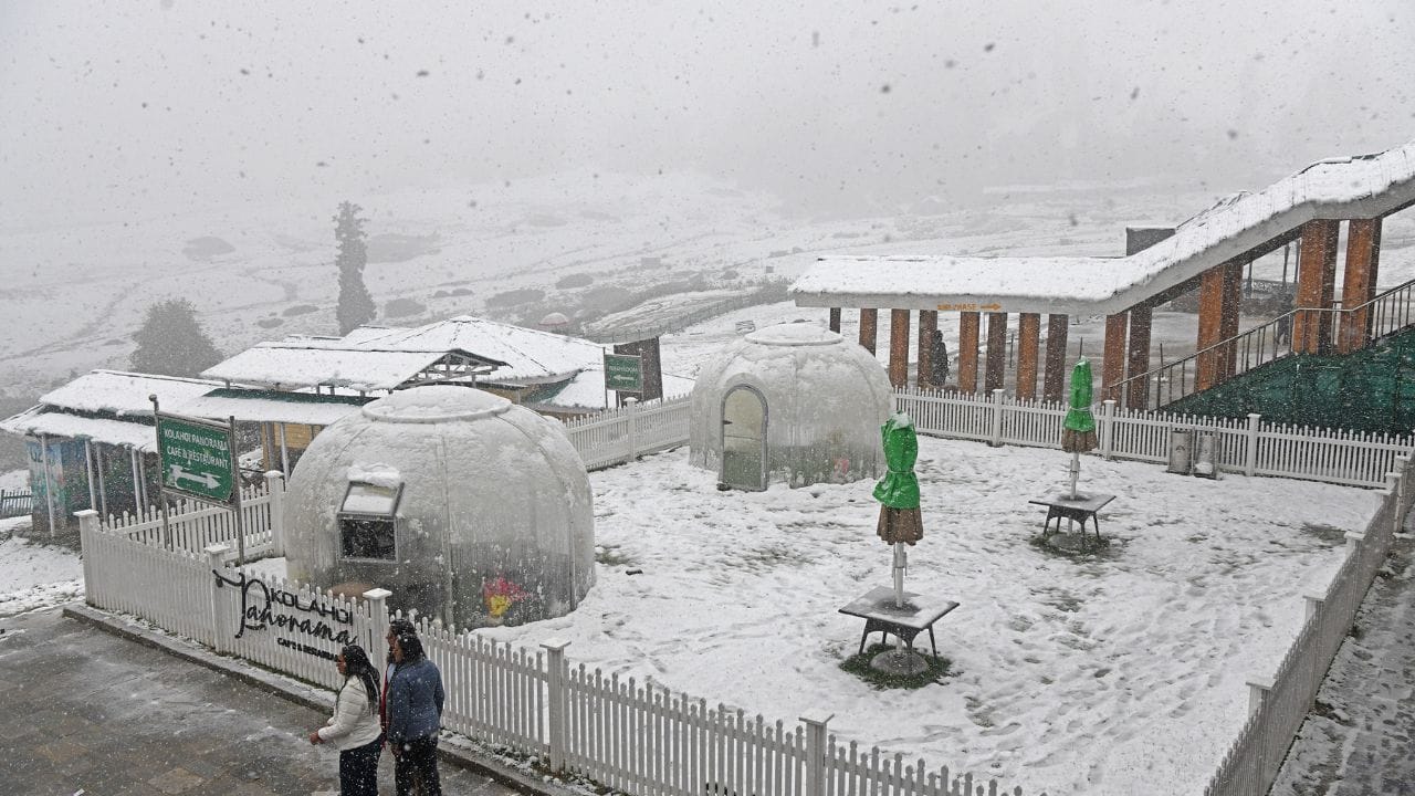 The first snowfall of the season at Kangdoori in Gulmarg brought smiles on the faces of tourists.