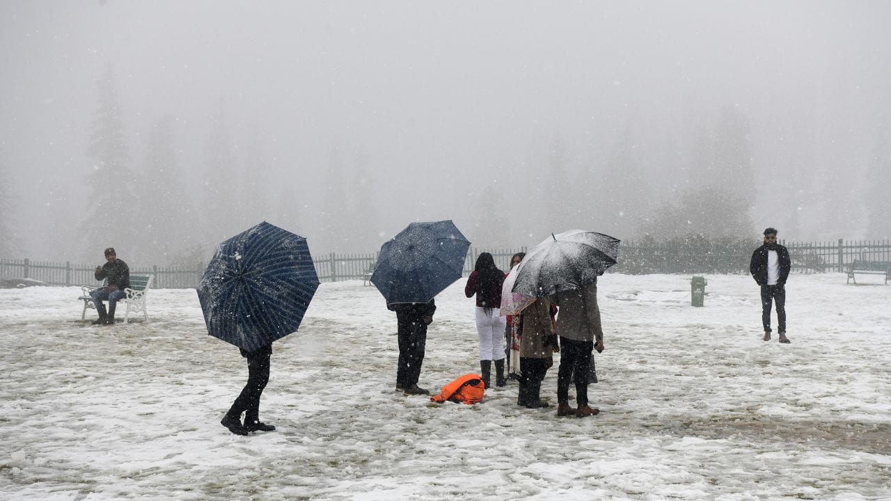 The first snowfall of the season at Kangdoori in Gulmarg brought smiles on the faces of tourists.