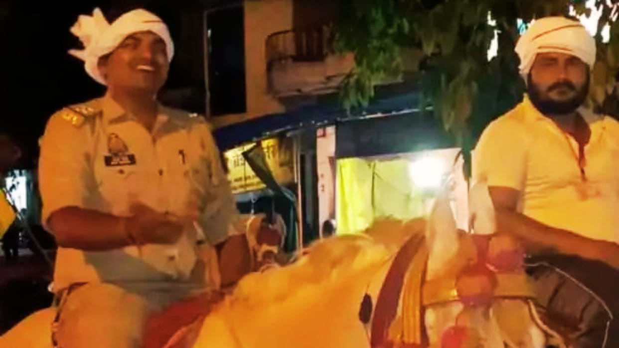 Outpost in-charge seen riding horse with history-sheeter viral photo sparks uproar in chandauli