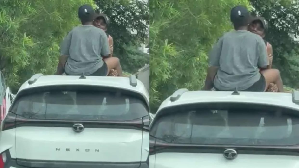 Couple seen openly kissing on the roof of a moving car onlookers erupt in anger video goes viral