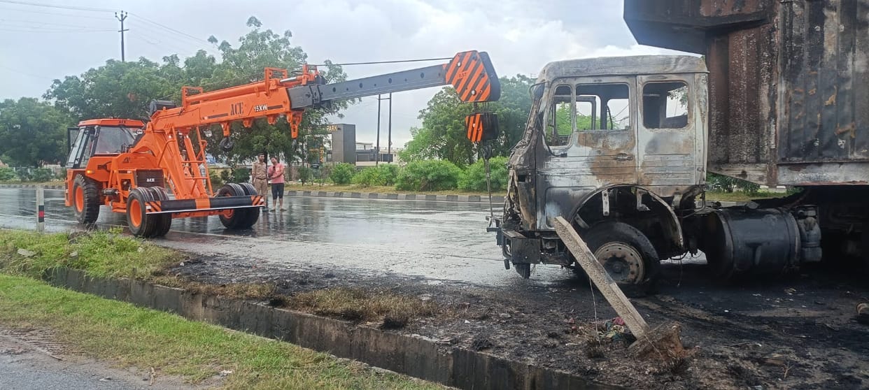 Container loaded with cars catches fire in Agra