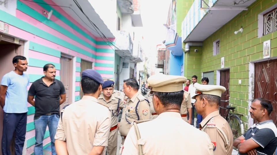 Man shot dead over dog burial dispute mother and son fell at his feet and pleaded