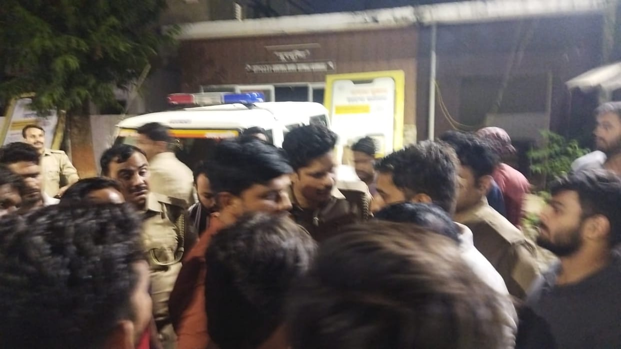 Kannauj Policeman beats BJP worker with rifle butt BJP workers create ruckus