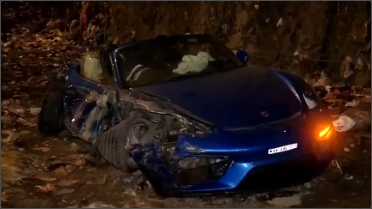 A Porsche car crash in divider while racing with BMW car, Accident on Western Express Highway in Mumbai