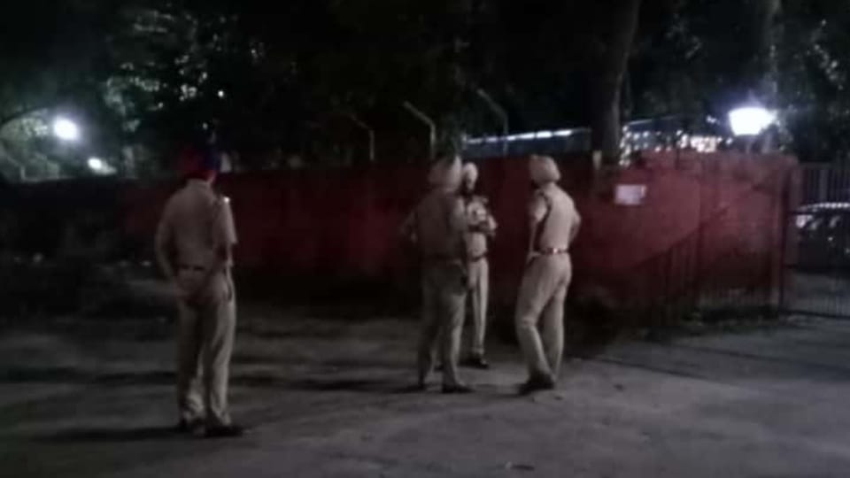 Policemen point guns at each other Chandigarh and Punjab police face off to arrest the accused