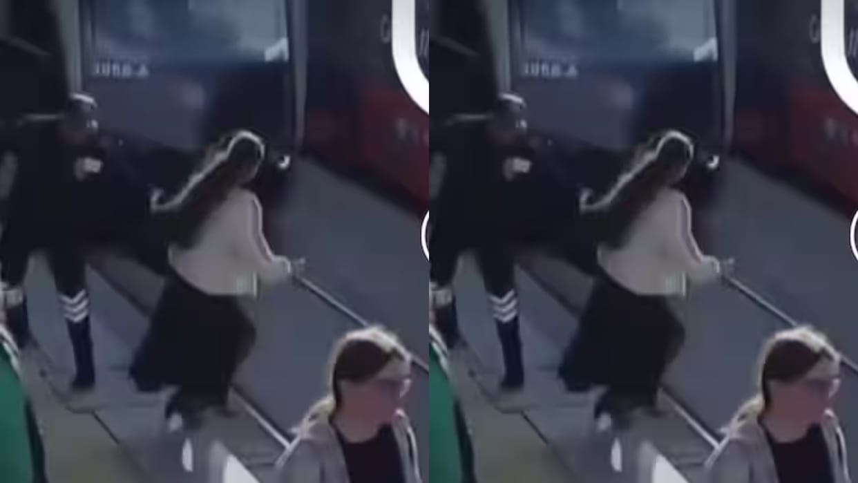A girl was crossing the railway track with earphones in her ears when suddenly a train came Video Viral