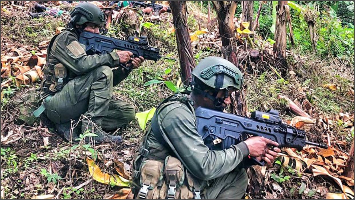 Clash between Indonesian army and insurgents leaves 14 dead in village in Papua region