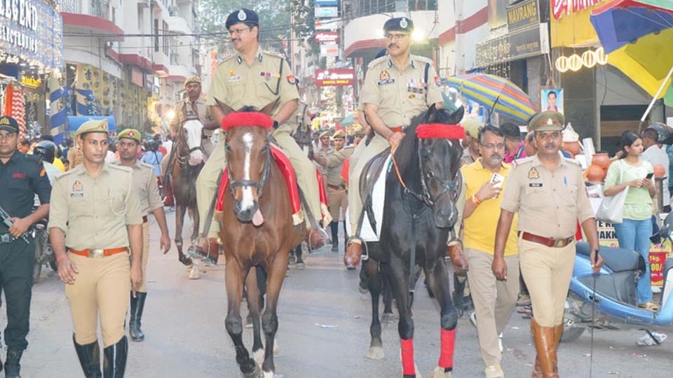 Kanpur: Police officers on horseback kept an eye on troublemakers, interacted with shopkeepers and traders