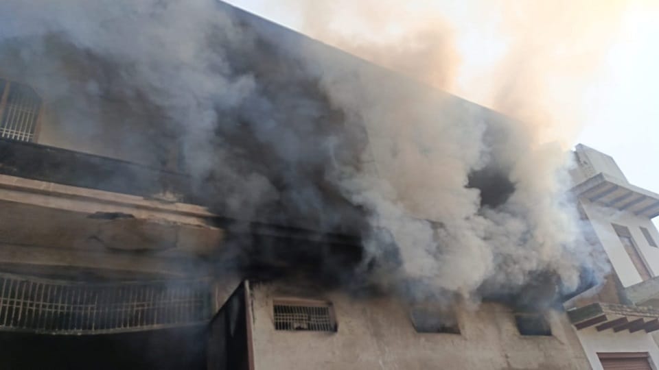 Fire broke out in a warehouse containing plastic bags and books and copies