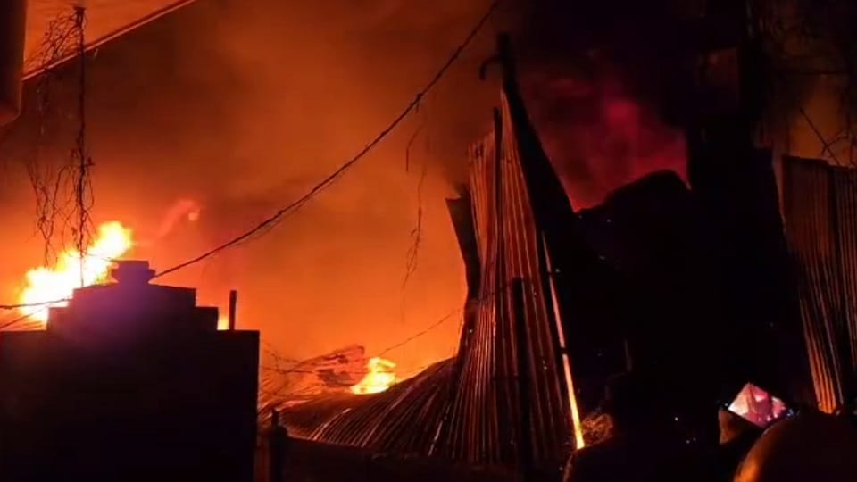 fire broke out in a junk shop three fire engines engaged in extinguishing it