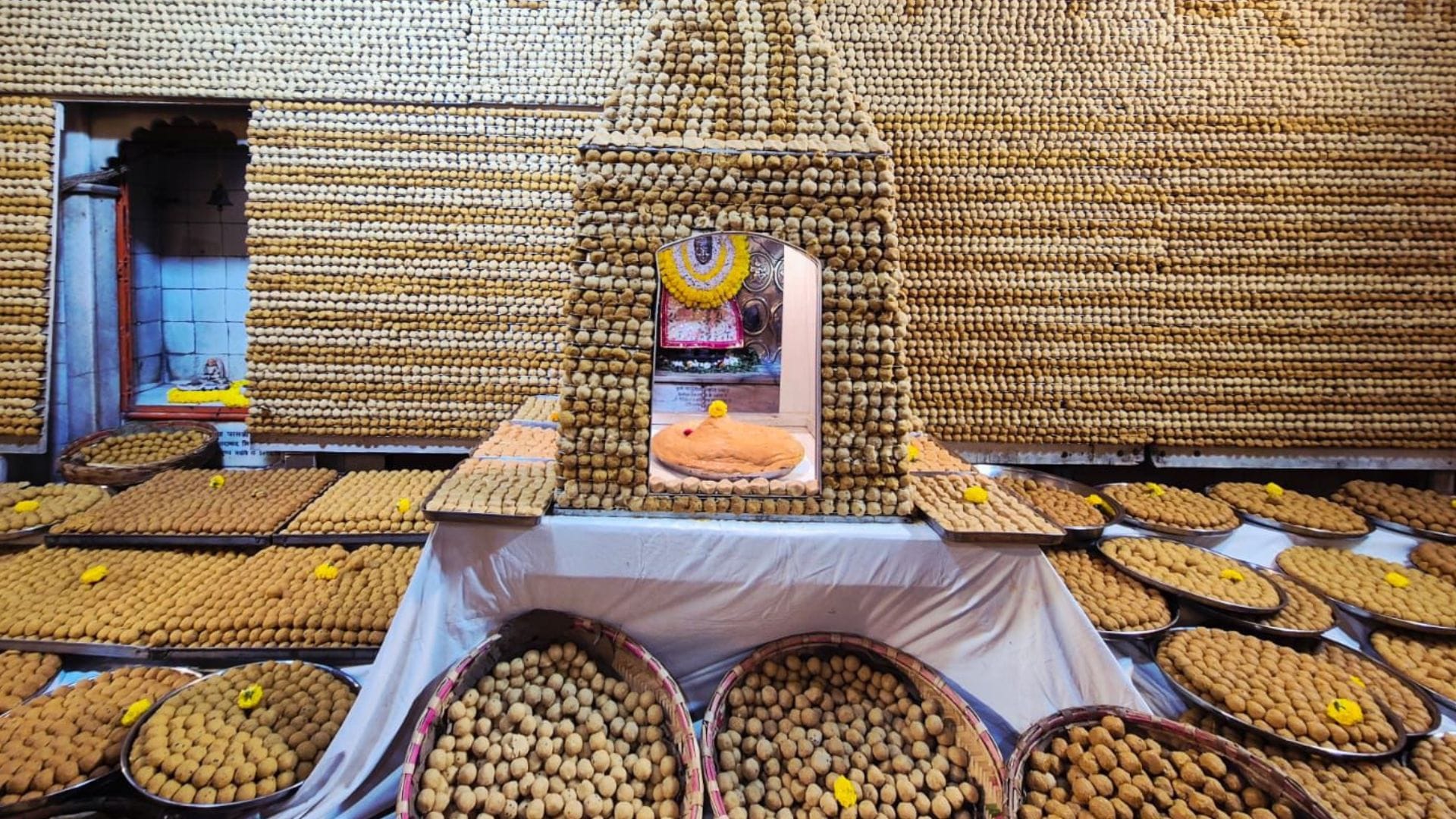 tableau of Goddess Annapurna adorned with 511 quintals of grain 56 offerings offered worship in temples