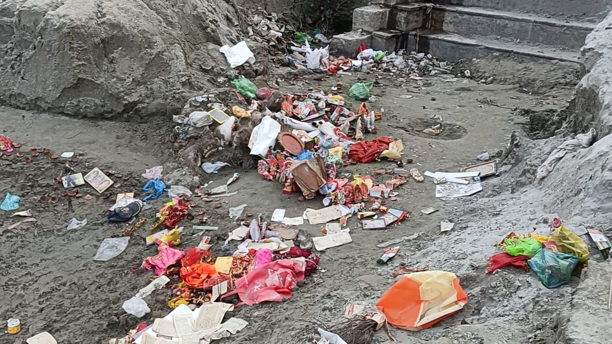 Kanpur Piles of garbage broken idols and flowers litter Ganga ghats after Deepotsav demanding clean up