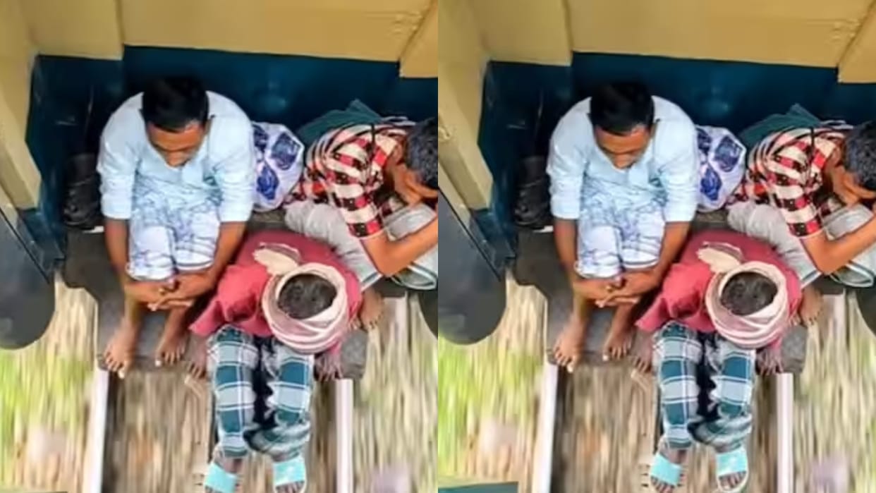 A man was seen hanging between two coaches of a high speed train Video goes viral on Internet