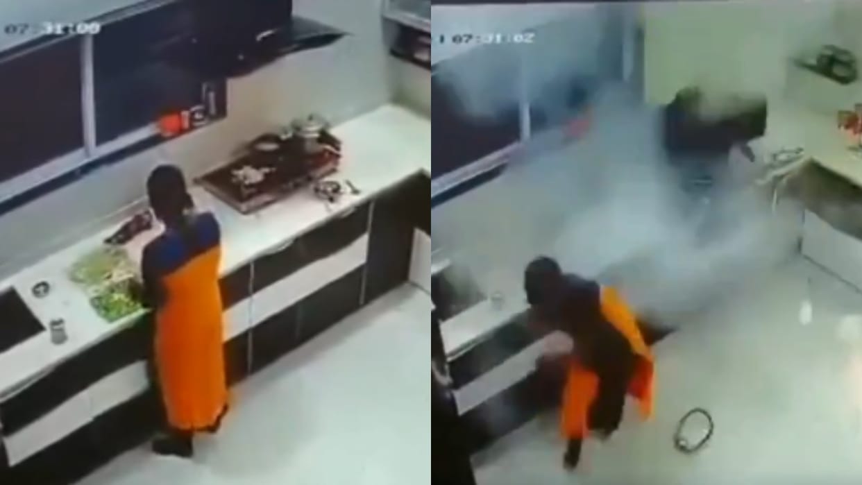 A woman was cooking in the kitchen when suddenly the pressure cooker exploded video went viral