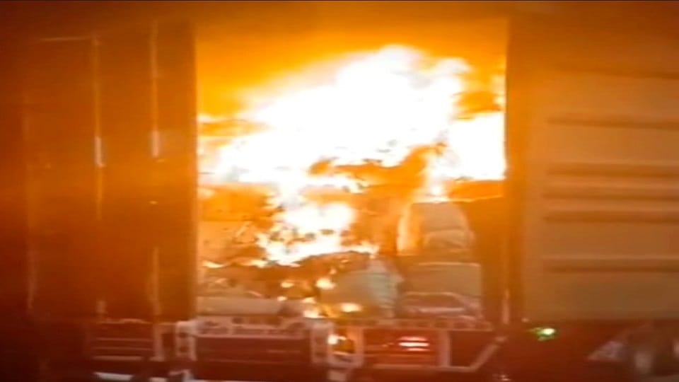 Firefighters chased the burning container
