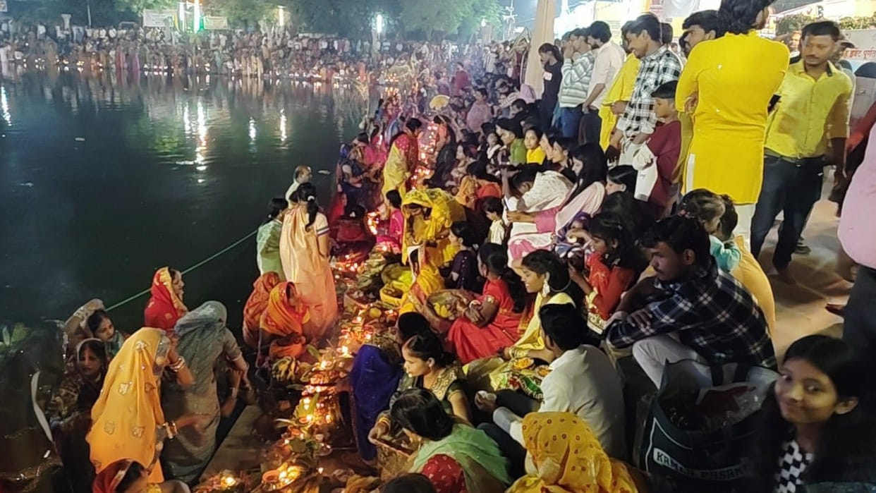 In Gorakhpur, fasting women celebrated Chhath festival amidst rain, offering prayers to the rising sun.