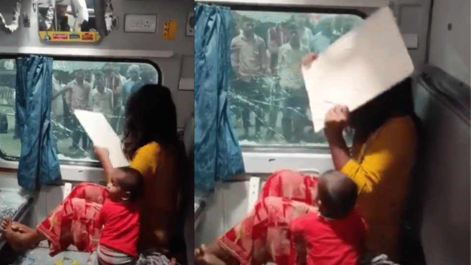 महिला ने तोड़ा ट्रेन का कांच