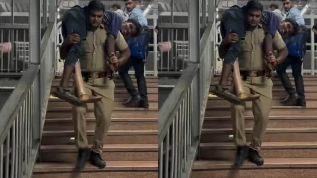 A disabled man was about to miss his train policeman came and picked him up on his shoulders Video Viral