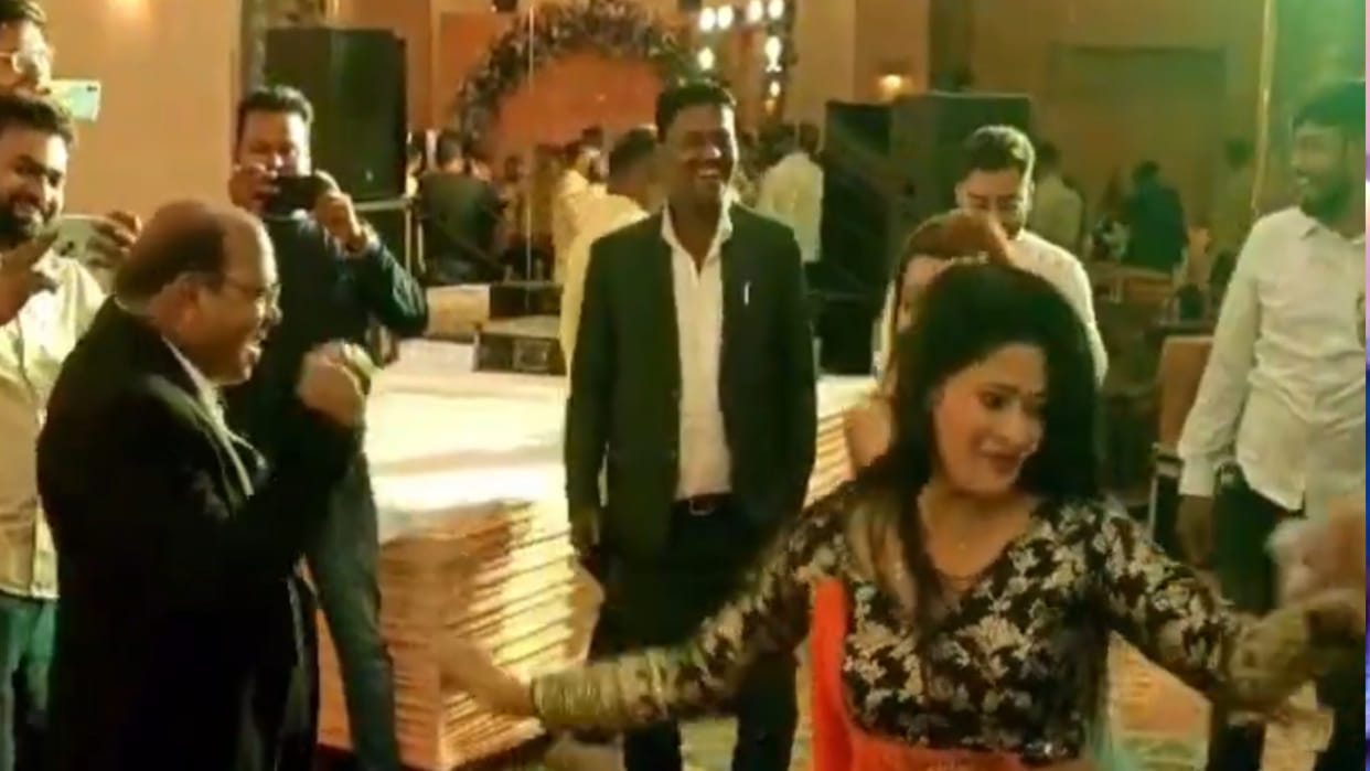 In Gorakhpur, At his retirement party, the JE danced with dancers and spent money.