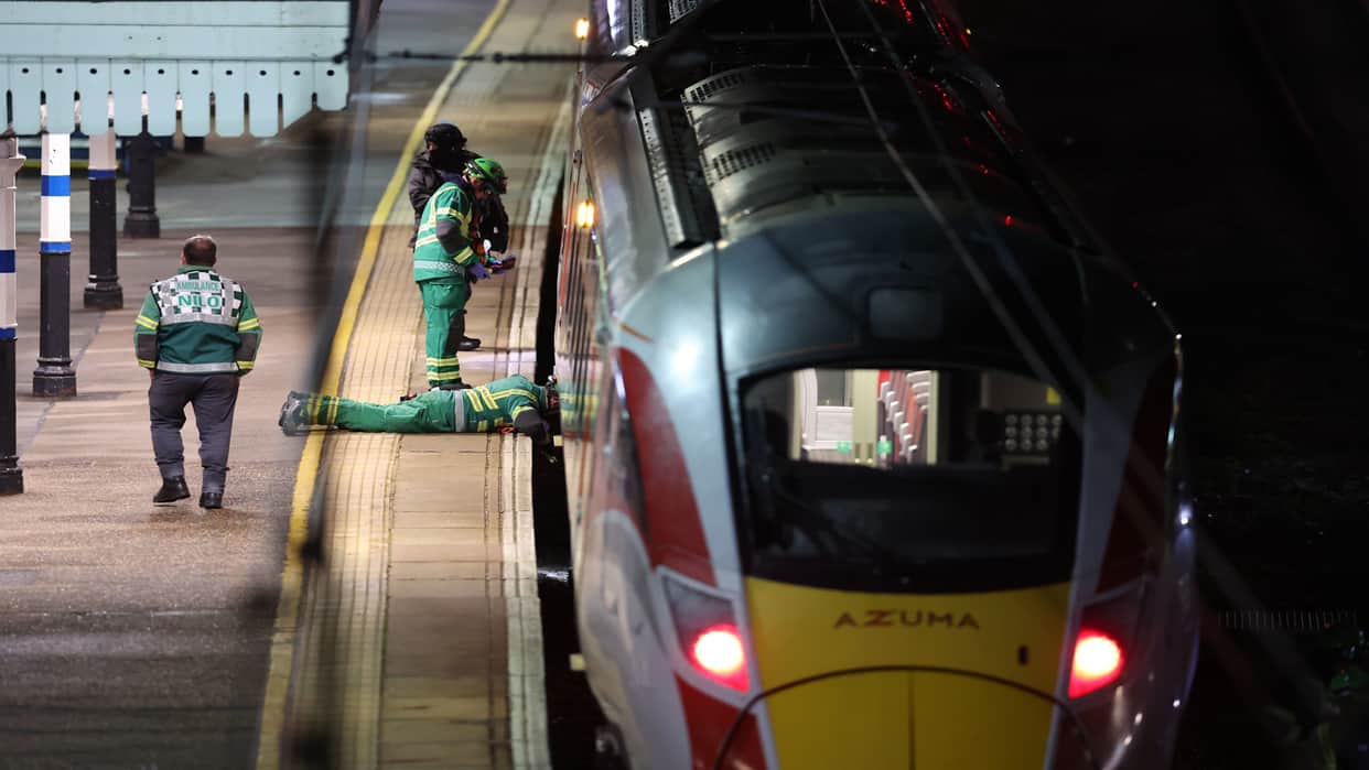 Passenger train derails in England; two people seriously injured; investigation underway.