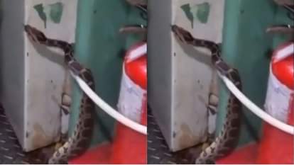 A 10 foot long python was found hiding in the train toilet causing panic among passengers Video goes Viral